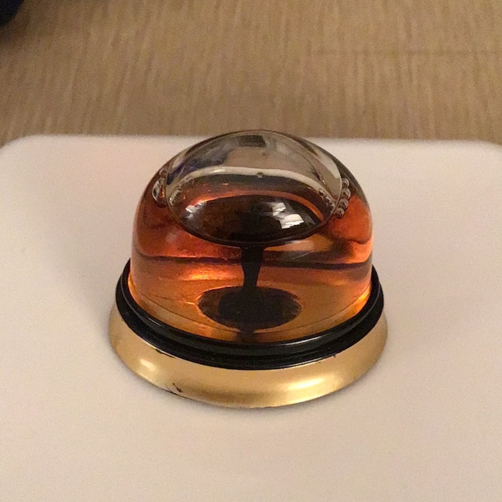 Jean Paul Gaultier perfume “Fragile” in mini-sized plastic dome